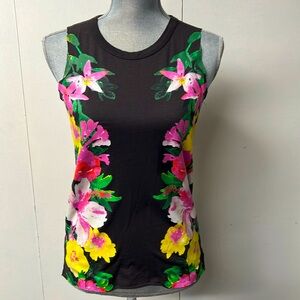 Black sleeveless t shirt withh painted flowers.